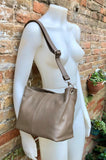 Light brown genuine leather bag. Small bucket bag, crossbody / shoulder bag. Taupe purse, lined + adjustable strap.Tan brown leather purse