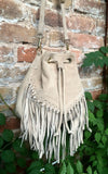Crossbody / shoulder fringed bag. Beige BOHO suede leather drawstring bag with long FRINGES. Genuine leather hippy bag. Suede fringed purse.