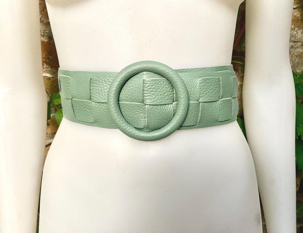 Sage green leather waist belt with large round buckle. Mint green boho soft genuine leather belt.Light green wide waist belt.Braided leather