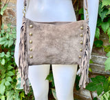 Taupe brown suede crossbody bag with tacks and fringes. Light brown suede hippy purse. Genuine suede leather boho bag in light greyge brown