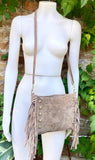 Taupe brown suede crossbody bag with tacks and fringes. Light brown suede hippy purse. Genuine suede leather boho bag in light greyge brown