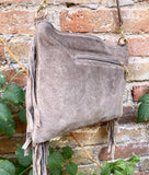 Taupe brown suede crossbody bag with tacks and fringes. Light brown suede hippy purse. Genuine suede leather boho bag in light greyge brown