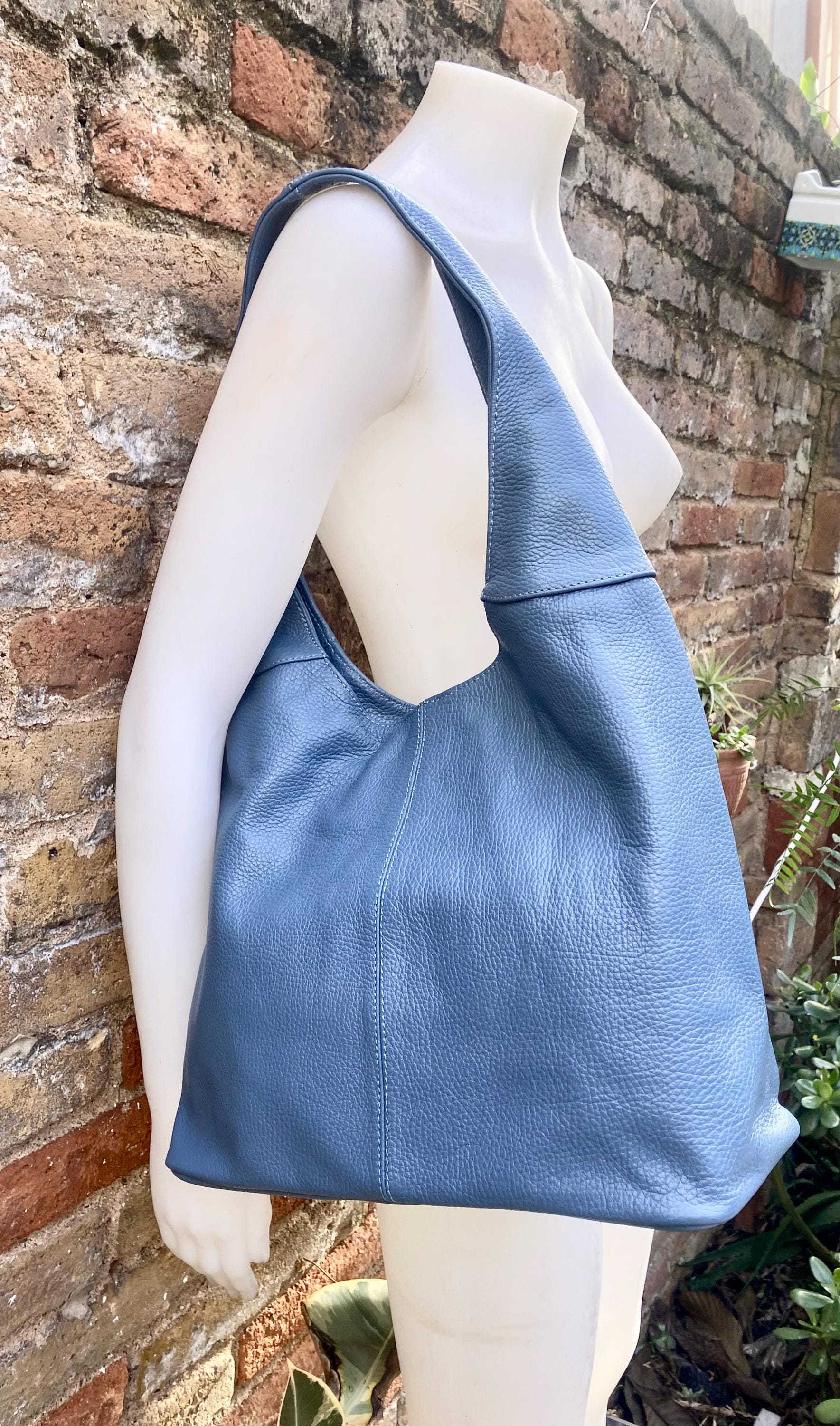 Blue genuine leather shoulder bag. Blue - gray slouchy bag. Wide strap, lined closed with a zipper. Denim blue leather shopper.