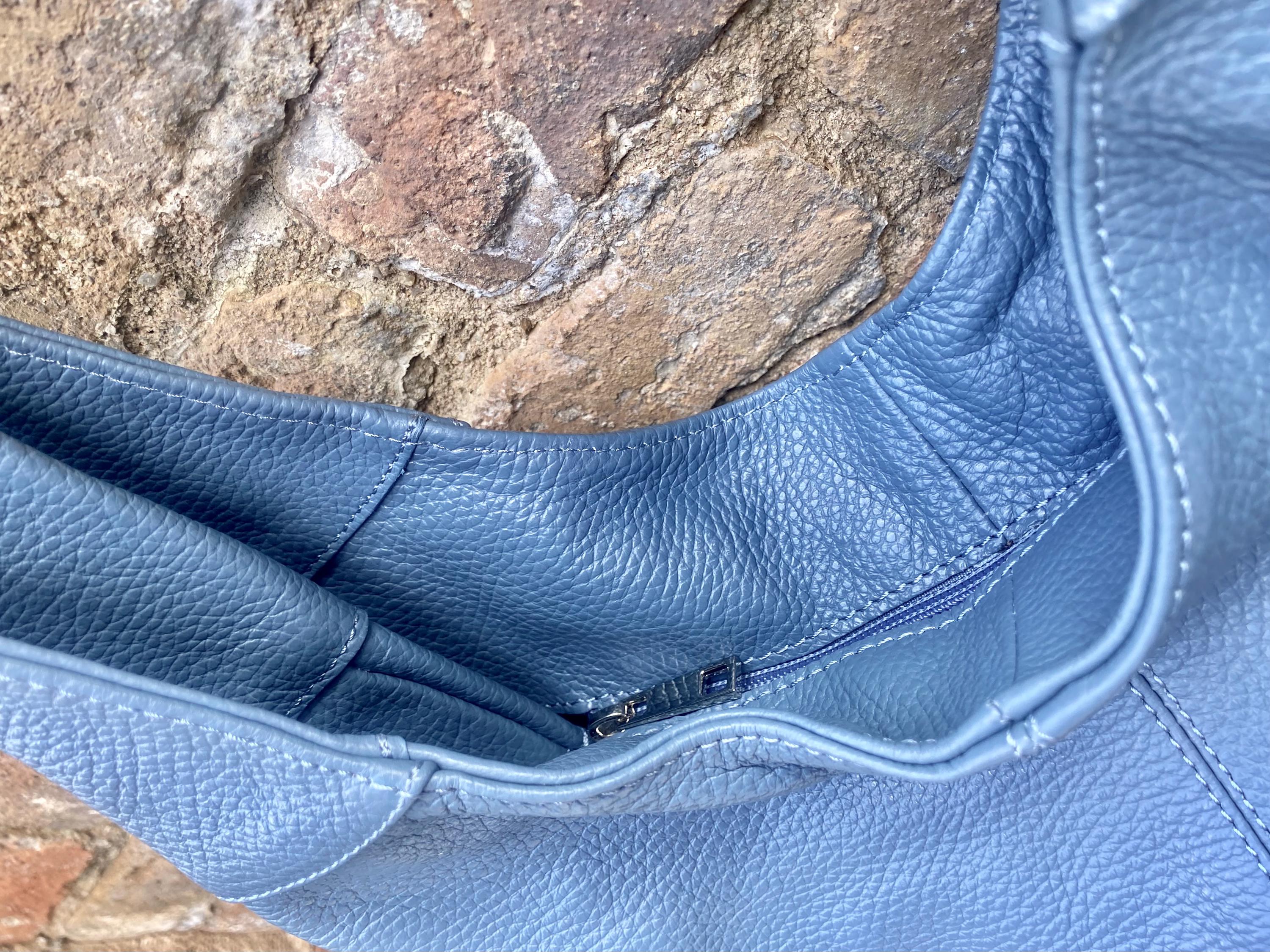 Blue genuine leather shoulder bag. Blue - gray slouchy bag. Wide strap, lined closed with a zipper. Denim blue leather shopper.