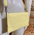 Small leather bag in light YELLOW.Cross body bag, shoulder bag in GENUINE leather. Yellow bag with adjustable strap, zipper and flap.