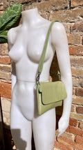 Small leather bag in light green. GENUINE leather cross body / shoulder bag in green, leather bag with adjustable strap, zipper and flap