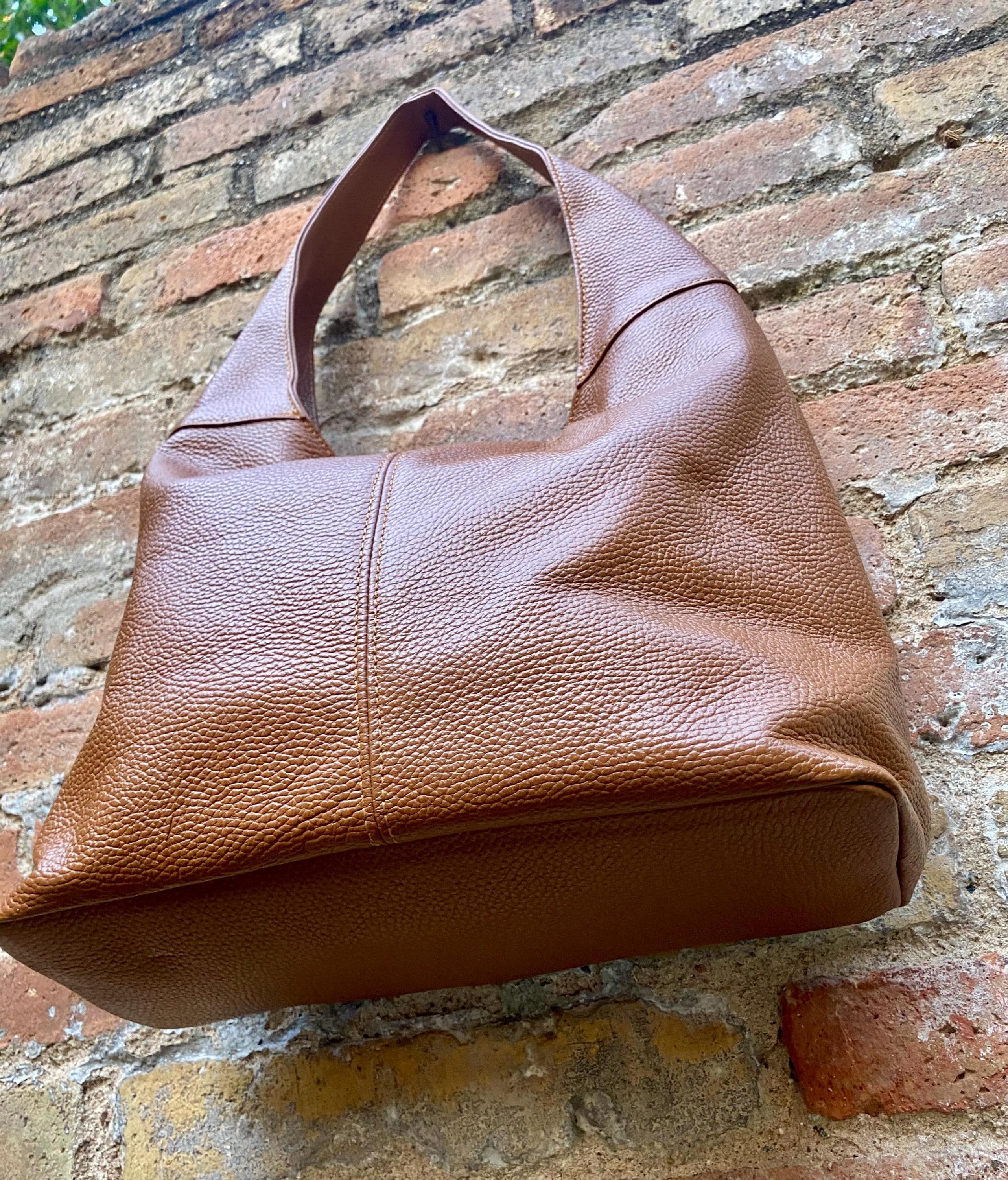 Camel brown slouch leather bag . Lined shoulder leather bag with wide strap and zipper. Large brown GENUINE leather purse. Brown shopper bag