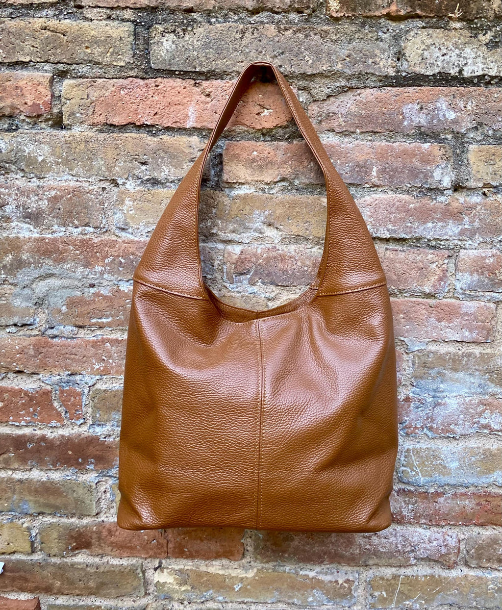 Camel brown slouch leather bag . Lined shoulder leather bag with wide strap and zipper. Large brown GENUINE leather purse. Brown shopper bag