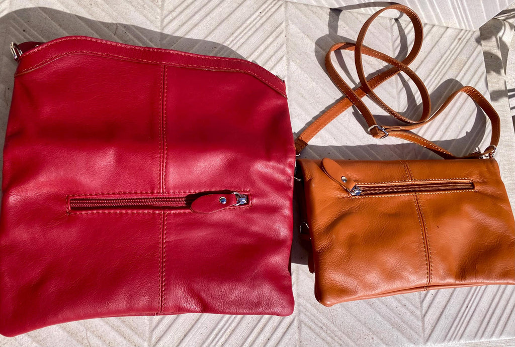 Small leather bag in light camel brown. GENUINE leather crossbody/shoulder bag. Tan brown bag with adjustable strap, zipper and flap.