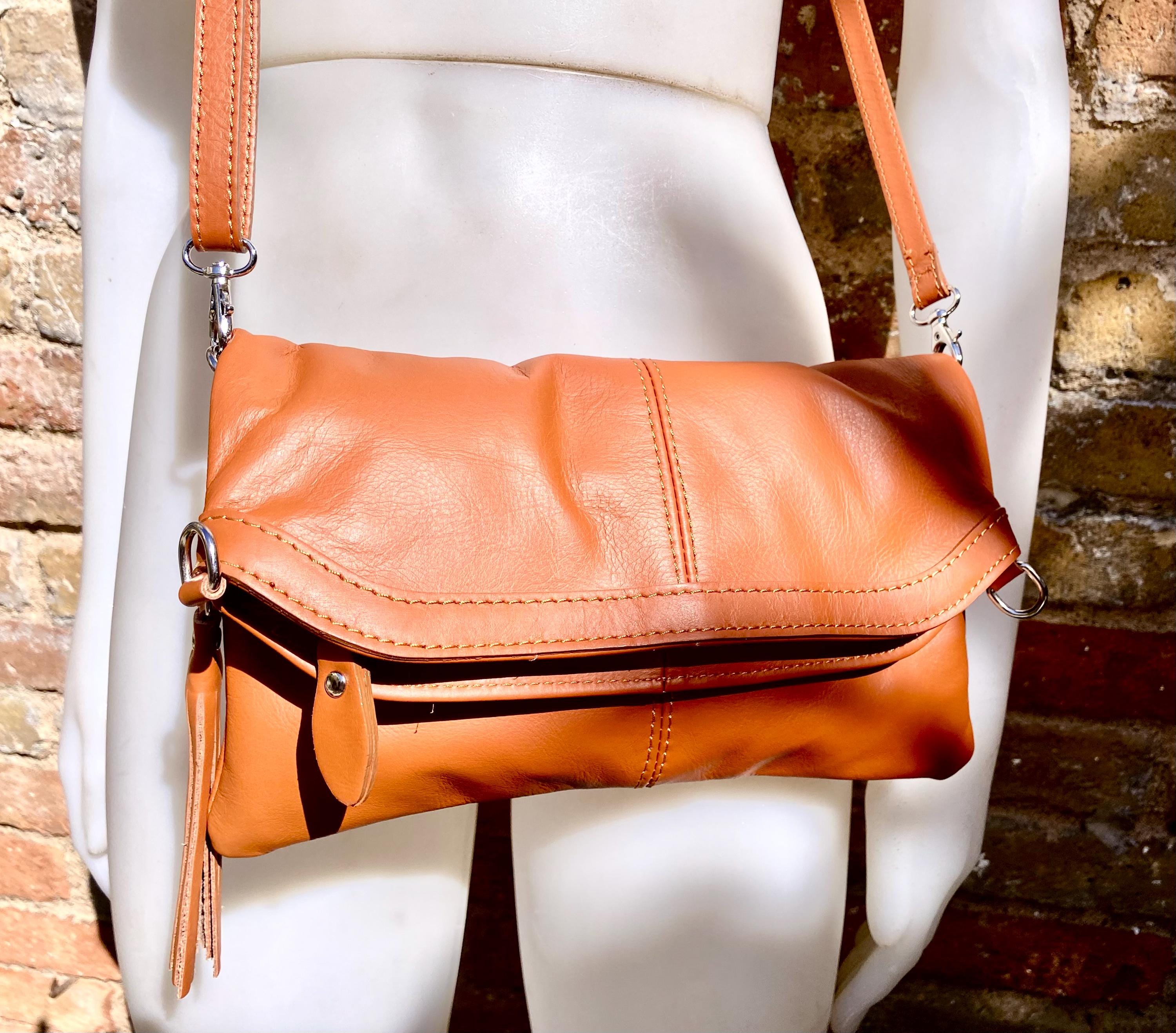 Small leather bag in light camel brown. GENUINE leather crossbody/shoulder bag. Tan brown bag with adjustable strap, zipper and flap.