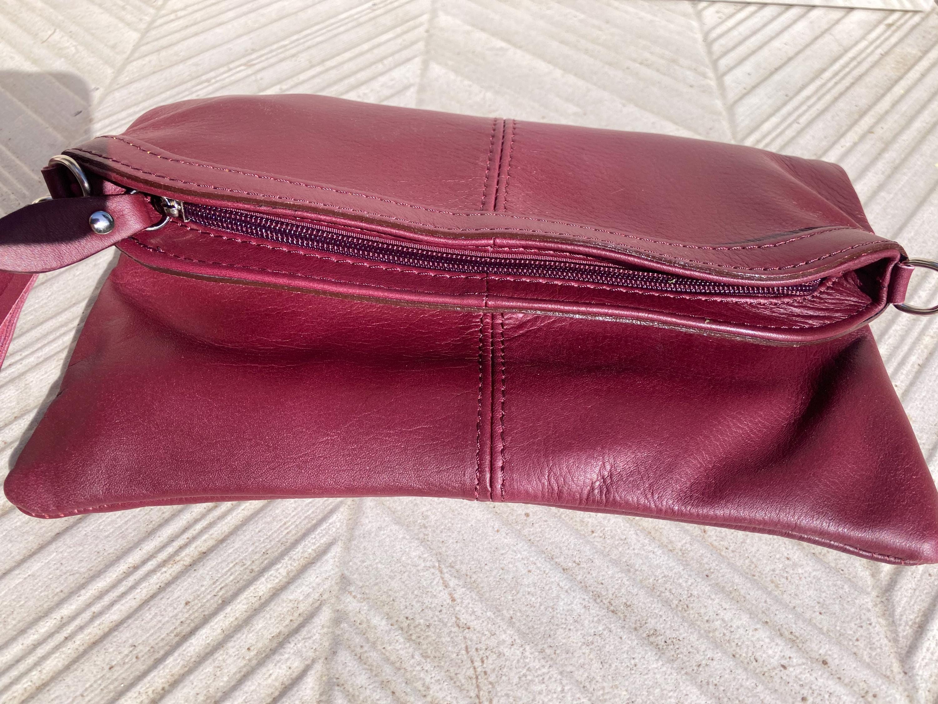 Small leather bag in burgundy. GENUINE leather cross body / shoulder bag in wine red with adjustable strap, zipper and flap.