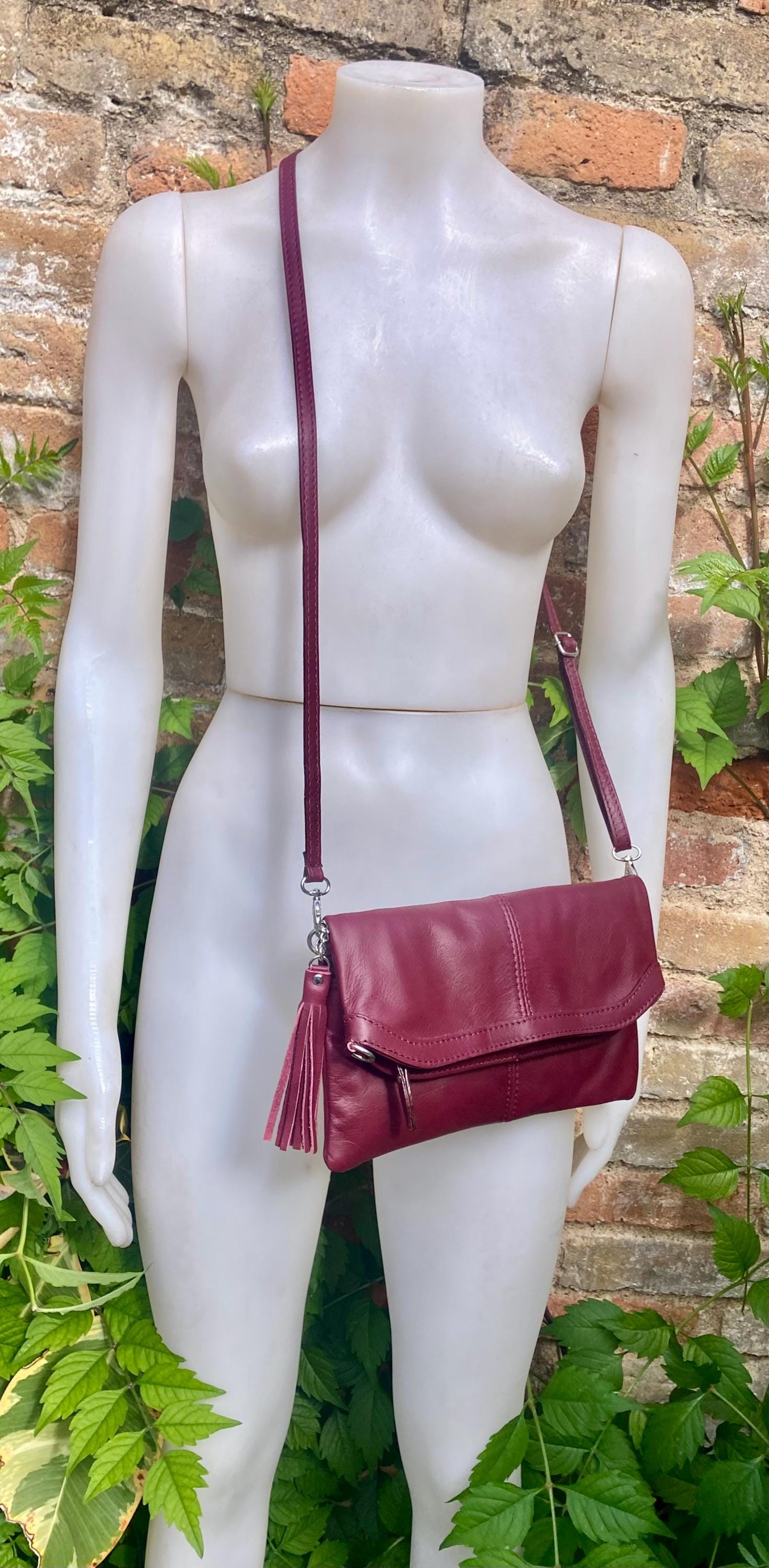 Small leather bag in burgundy. GENUINE leather cross body / shoulder bag in wine red with adjustable strap, zipper and flap.