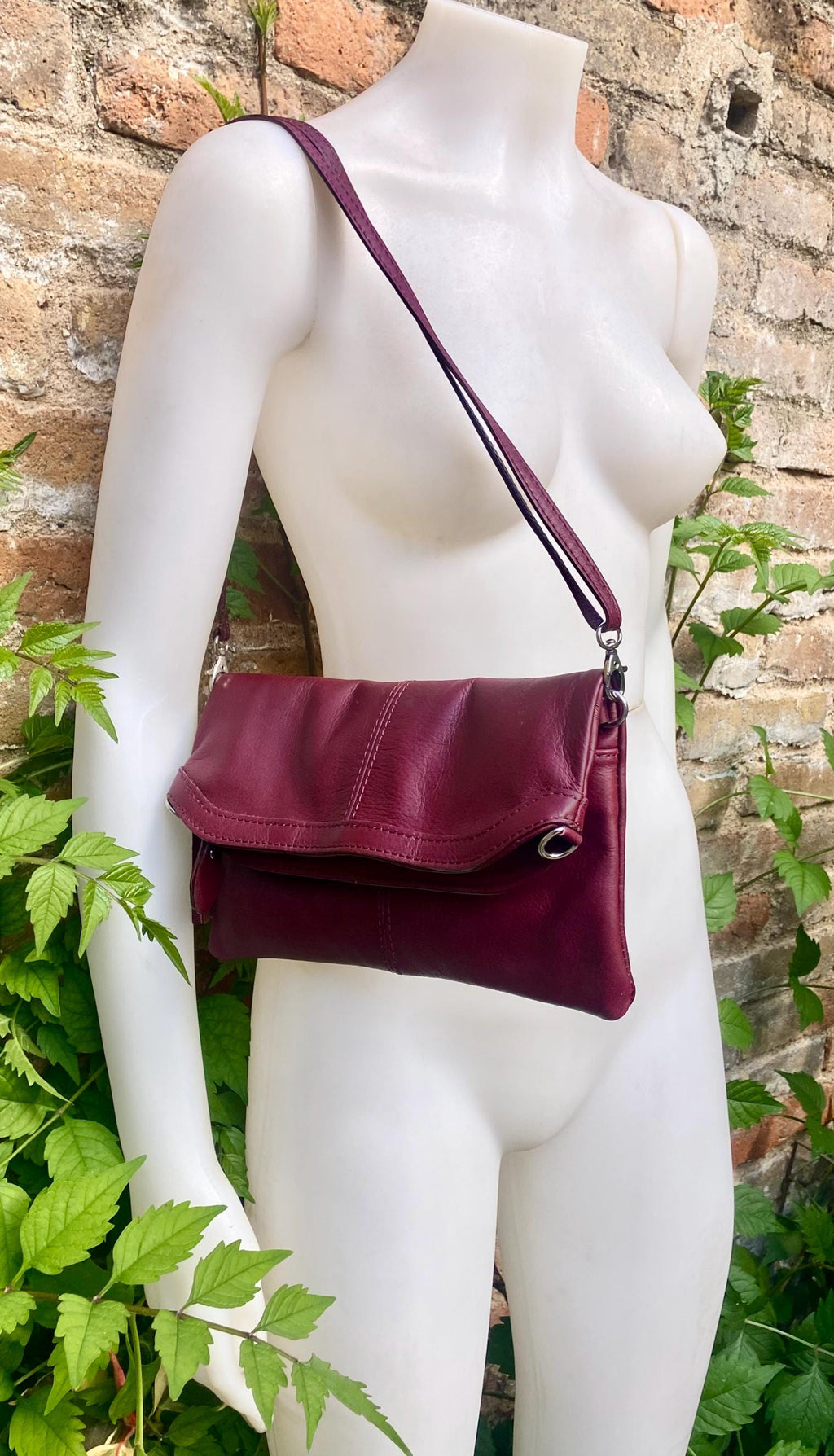 Small leather bag in burgundy. GENUINE leather cross body / shoulder bag in wine red with adjustable strap, zipper and flap.