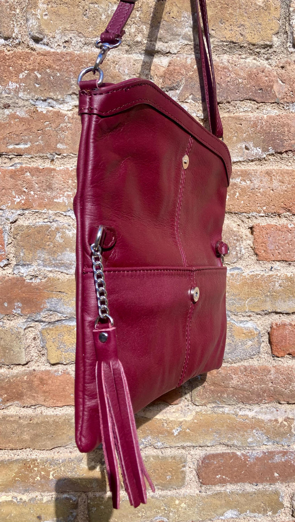 Small leather bag in burgundy. GENUINE leather cross body / shoulder bag in wine red with adjustable strap, zipper and flap.