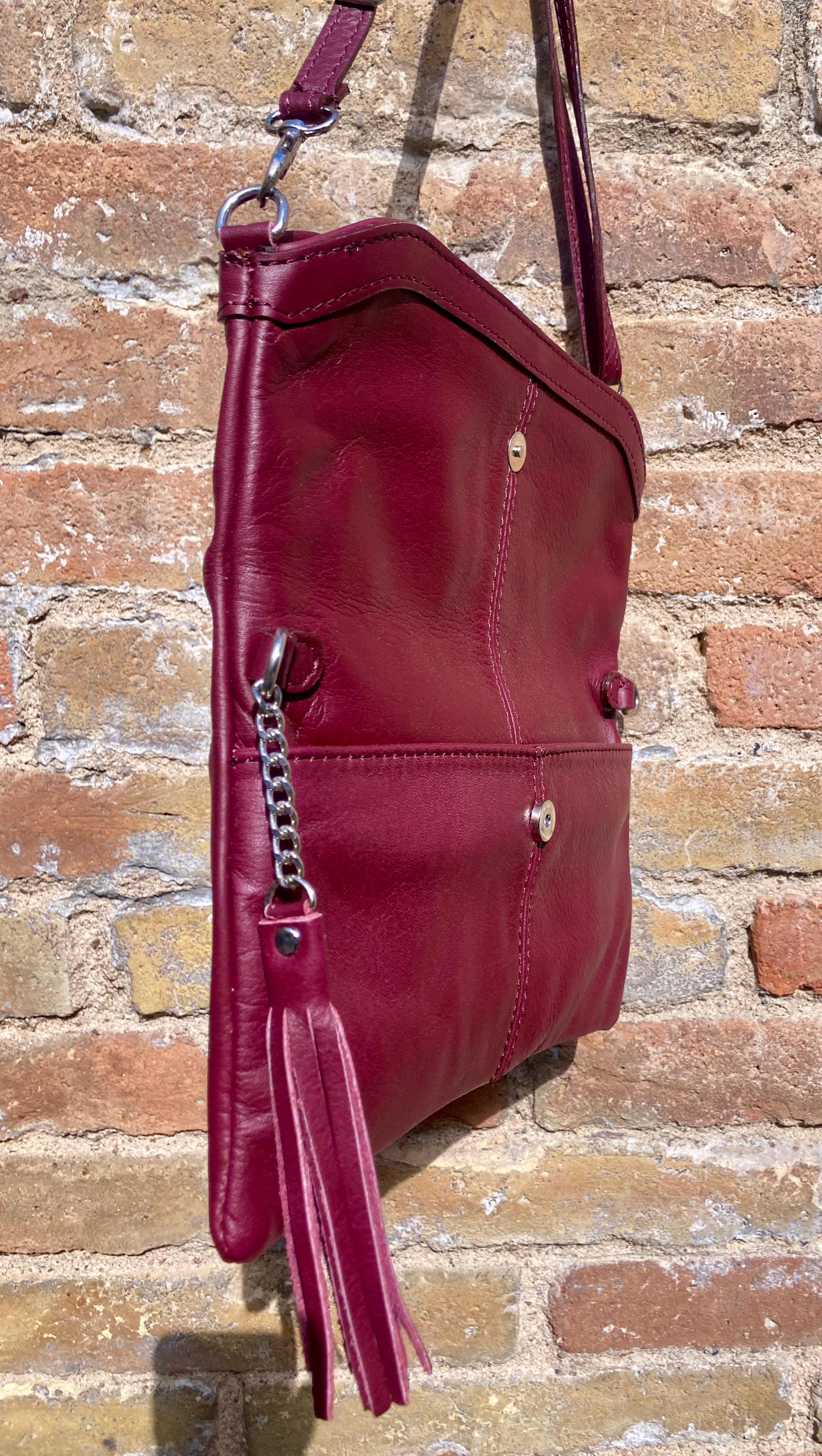 Small leather bag in burgundy. GENUINE leather cross body / shoulder bag in wine red with adjustable strap, zipper and flap.