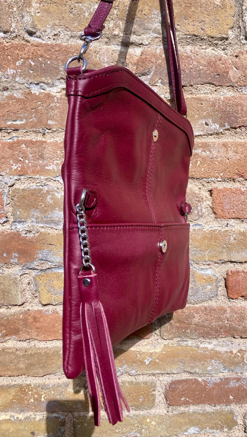 Small leather bag in burgundy. GENUINE leather cross body / shoulder bag in wine red with adjustable strap, zipper and flap.