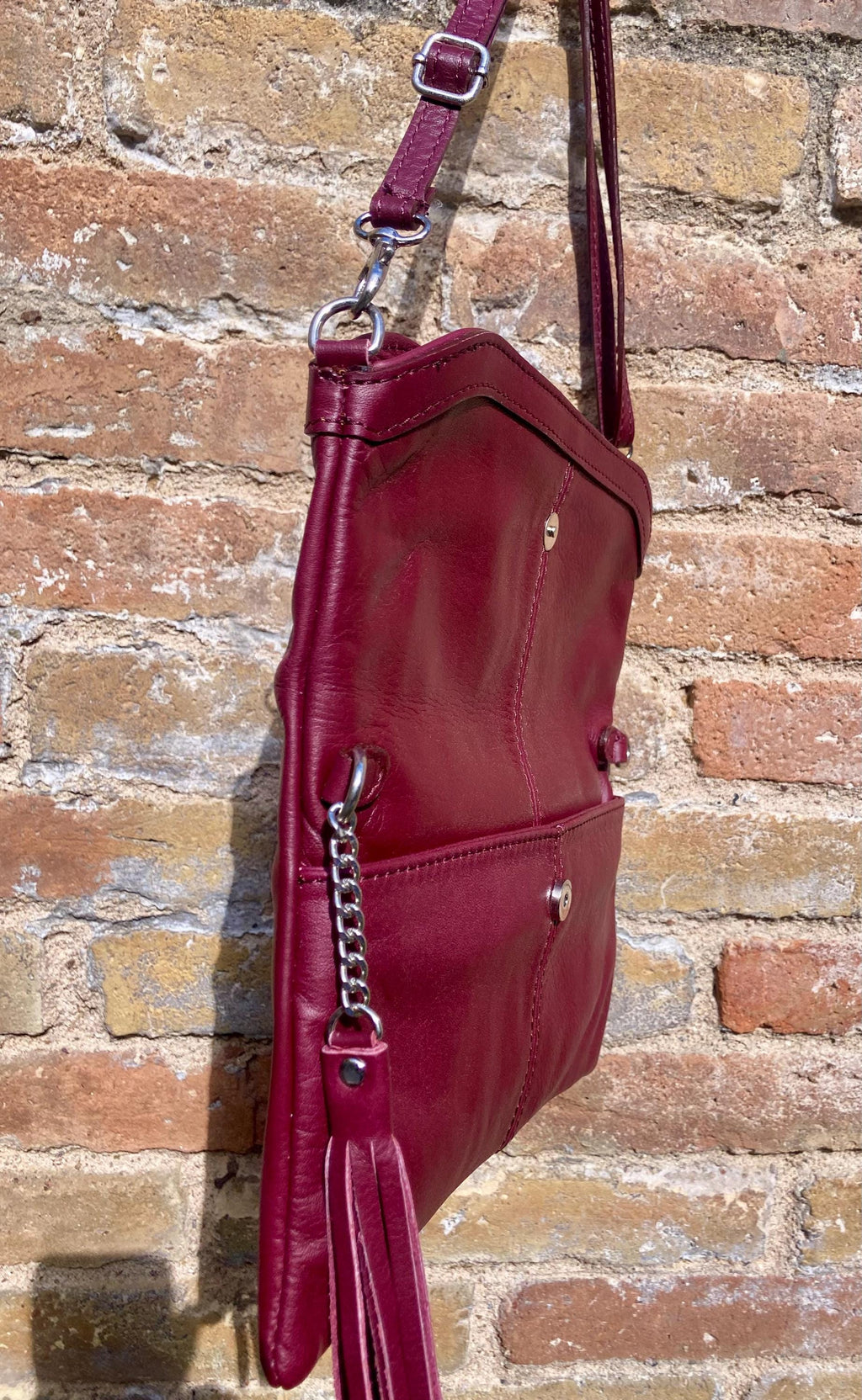Small leather bag in burgundy. GENUINE leather cross body / shoulder bag in wine red with adjustable strap, zipper and flap.