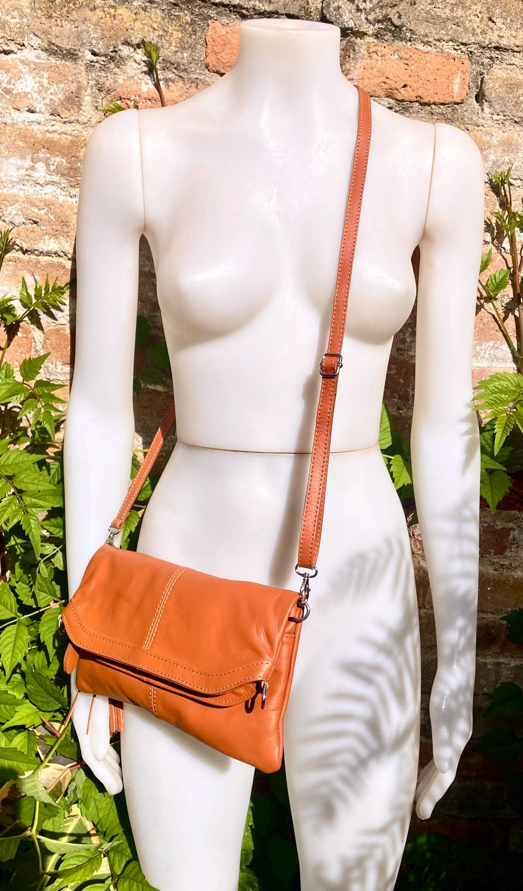 Small leather bag in light camel brown. GENUINE leather crossbody/shoulder bag. Tan brown bag with adjustable strap, zipper and flap.