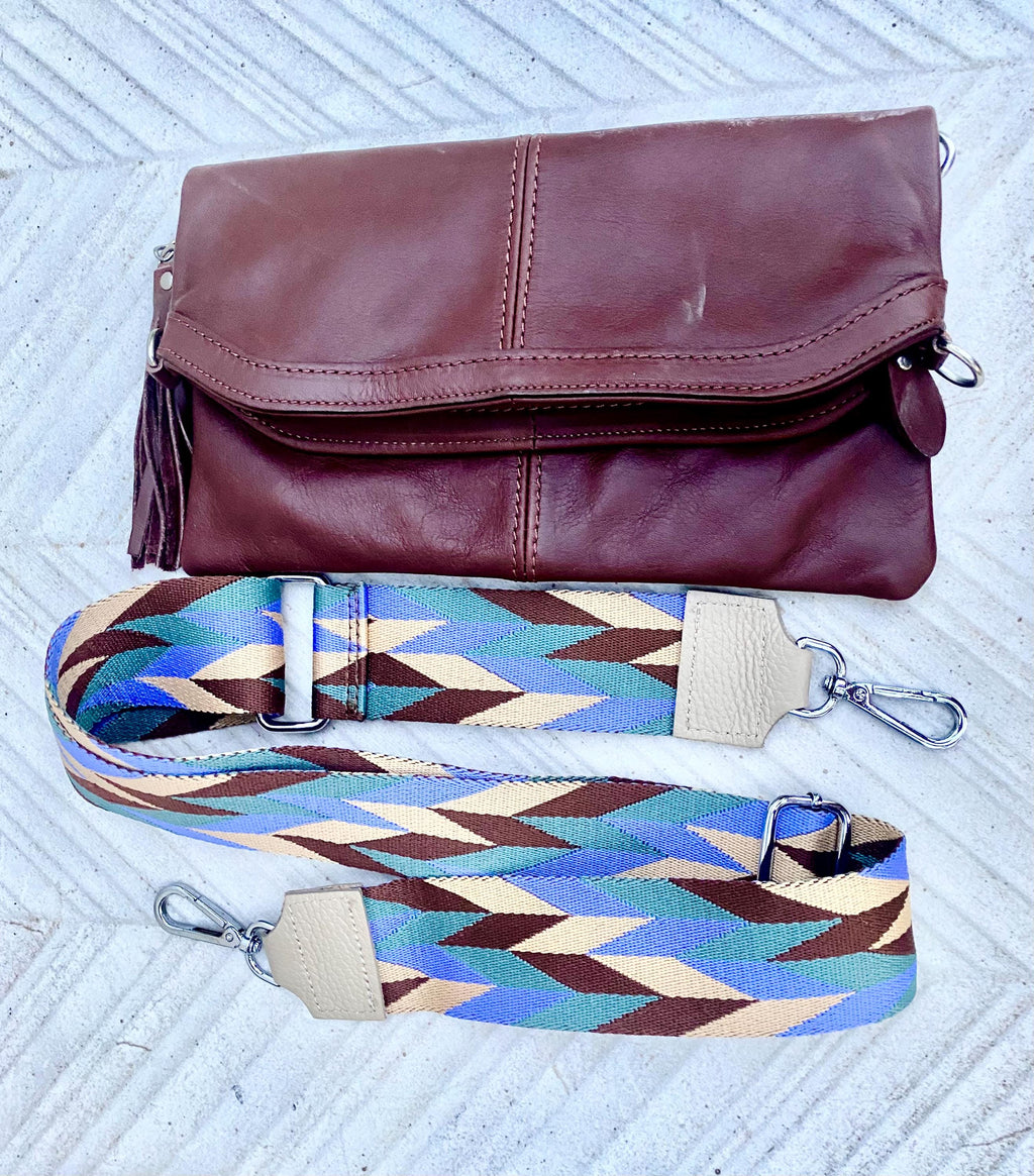 Small leather bag in dark brown. GENUINE leather crossbody/shoulder bag. Adjustable"guitar" strap, zipper and flap. Brown leather purse.
