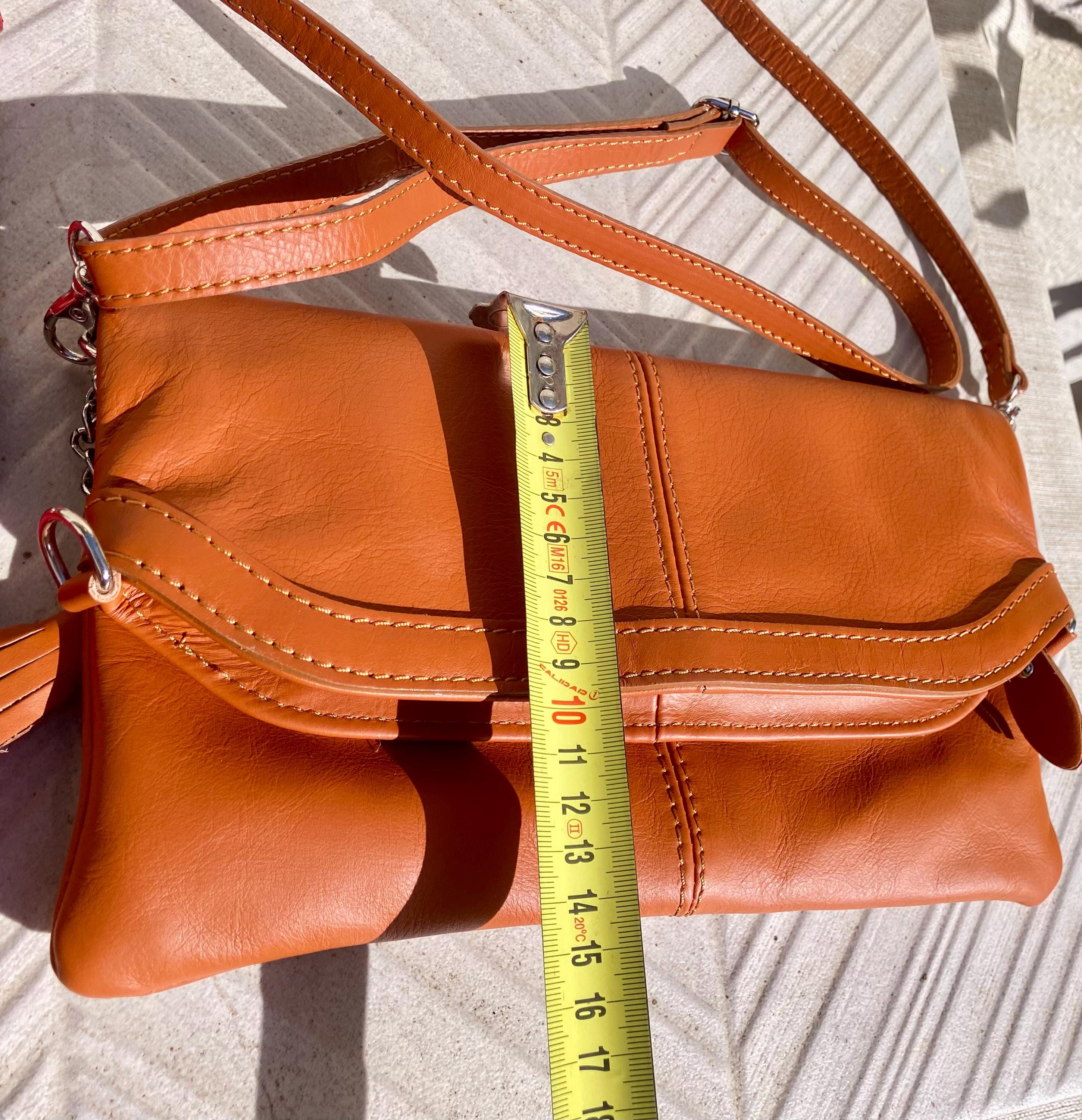 Small leather bag in dark brown. GENUINE leather crossbody/shoulder bag. Adjustable"guitar" strap, zipper and flap. Brown leather purse.