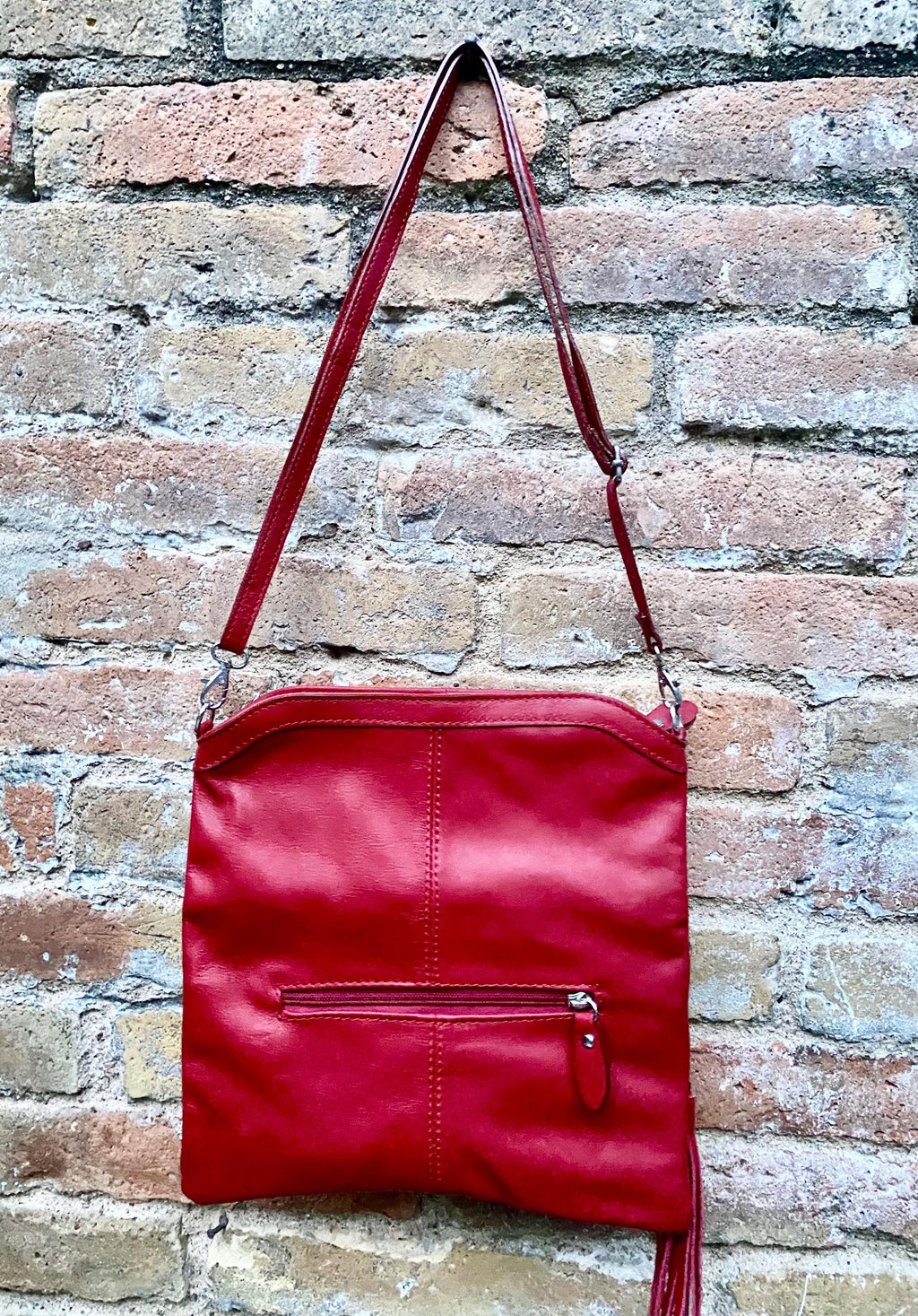 Small leather bag in RED. GENUINE leather cross body / shoulder bag in red with adjustable strap, zipper and flap.