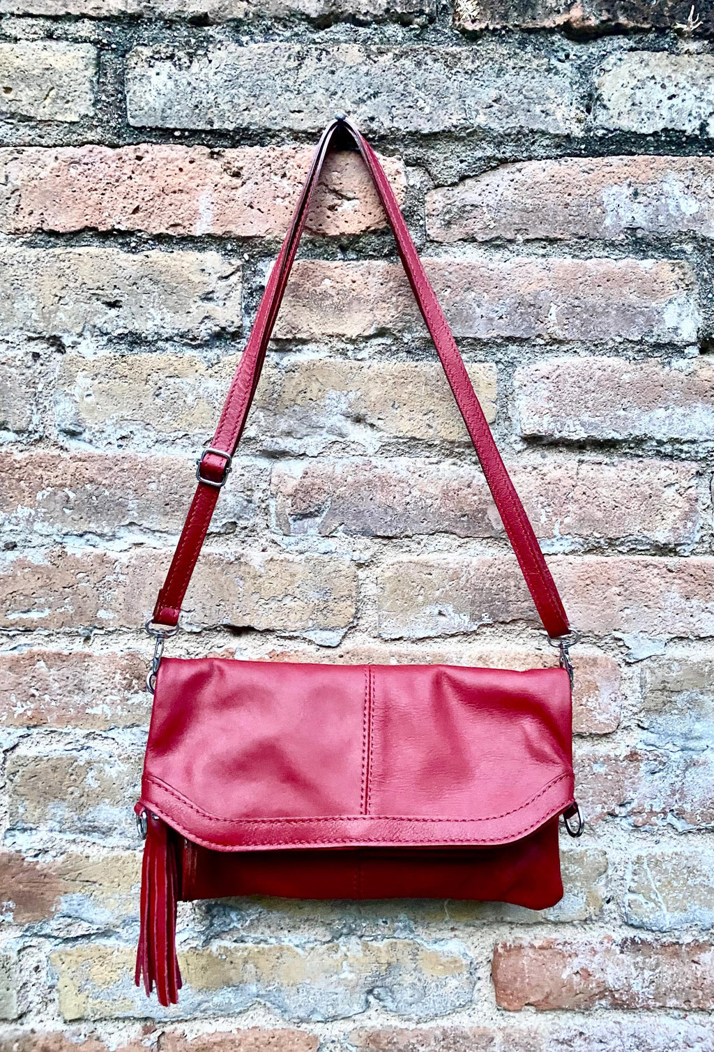 Small leather bag in RED. GENUINE leather cross body / shoulder bag in red with adjustable strap, zipper and flap.