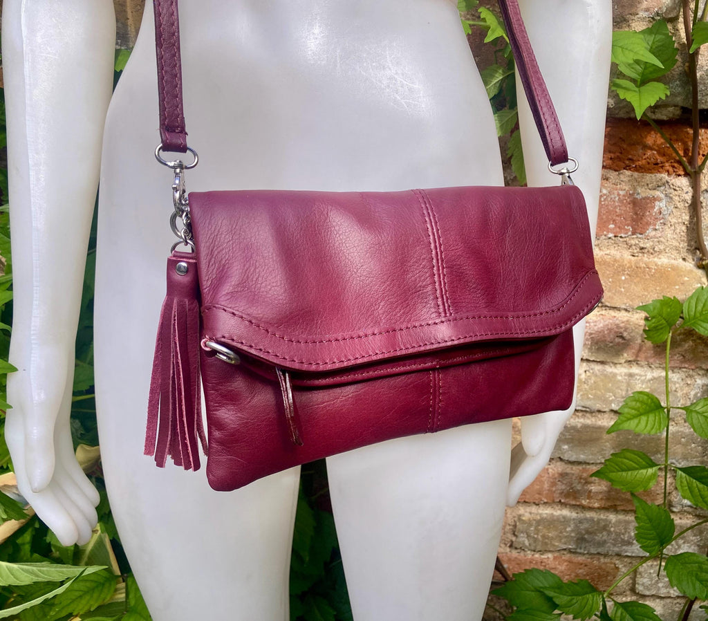 Small leather bag in burgundy. GENUINE leather cross body / shoulder bag in wine red with adjustable strap, zipper and flap.