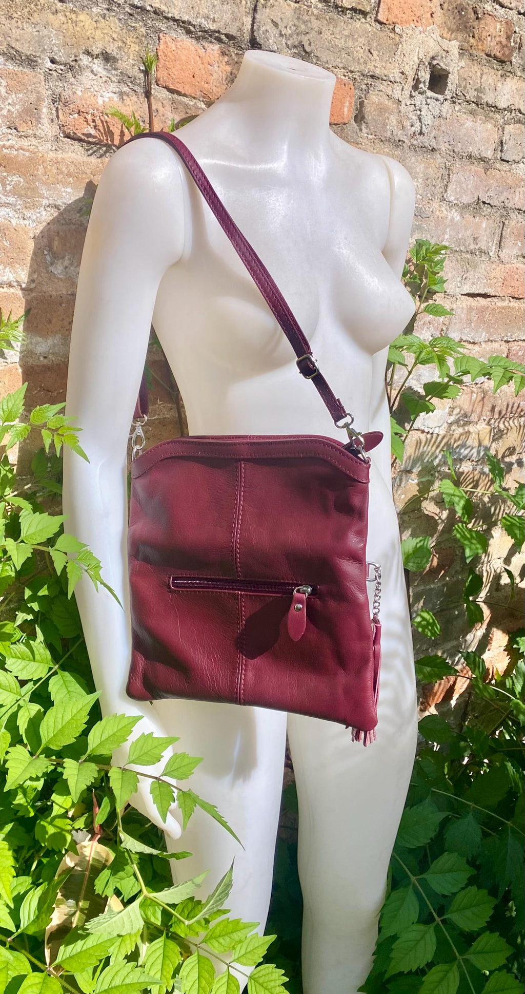 Small leather bag in burgundy. GENUINE leather cross body / shoulder bag in wine red with adjustable strap, zipper and flap.