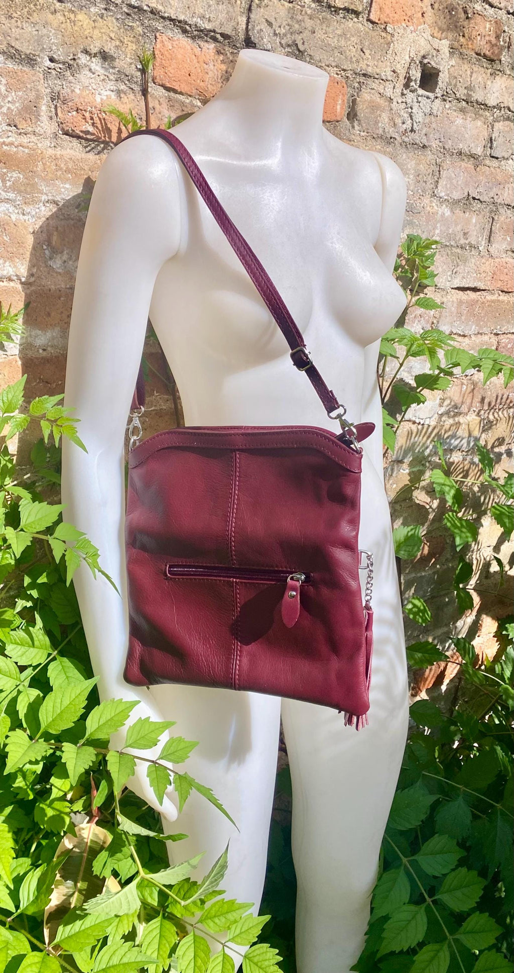 Small leather bag in burgundy. GENUINE leather cross body / shoulder bag in wine red with adjustable strap, zipper and flap.