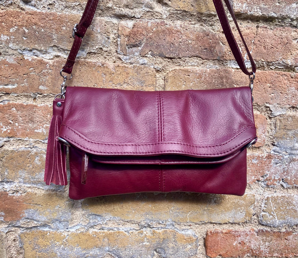 Small leather bag in burgundy. GENUINE leather cross body / shoulder bag in wine red with adjustable strap, zipper and flap.
