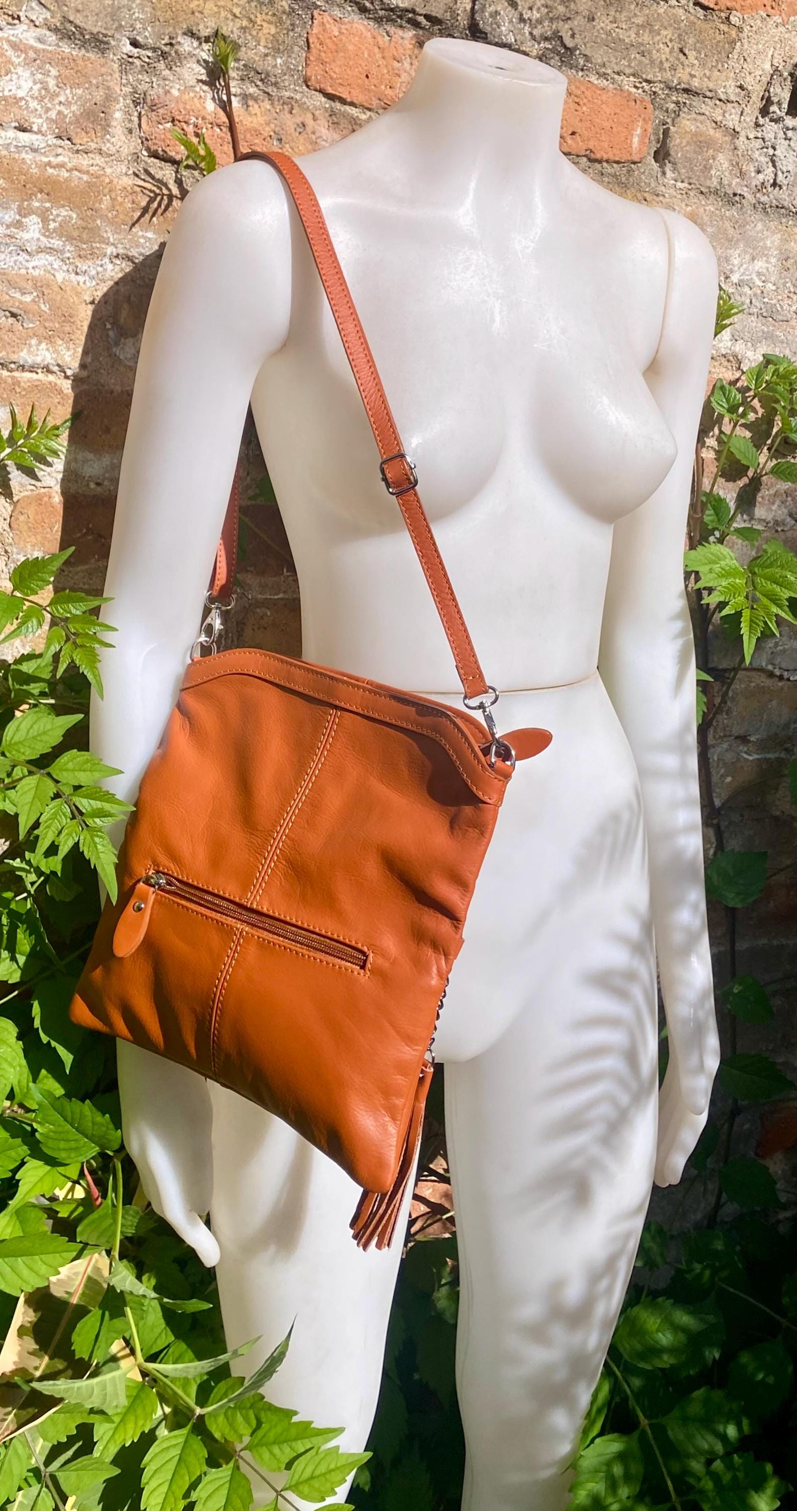Small leather bag in light camel brown. GENUINE leather crossbody/shoulder bag. Tan brown bag with adjustable strap, zipper and flap.