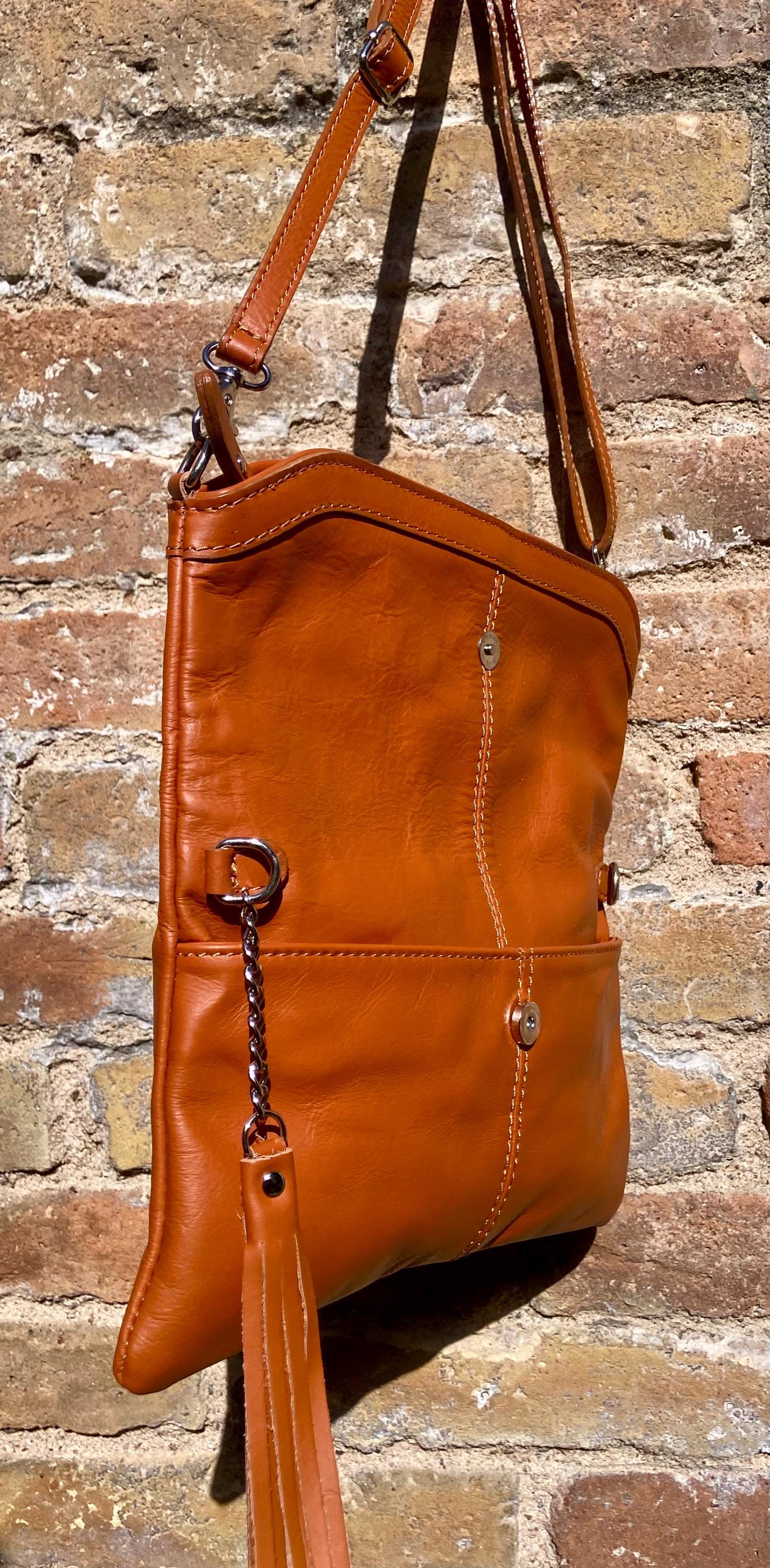 Small leather bag in light camel brown. GENUINE leather crossbody/shoulder bag. Tan brown bag with adjustable strap, zipper and flap.