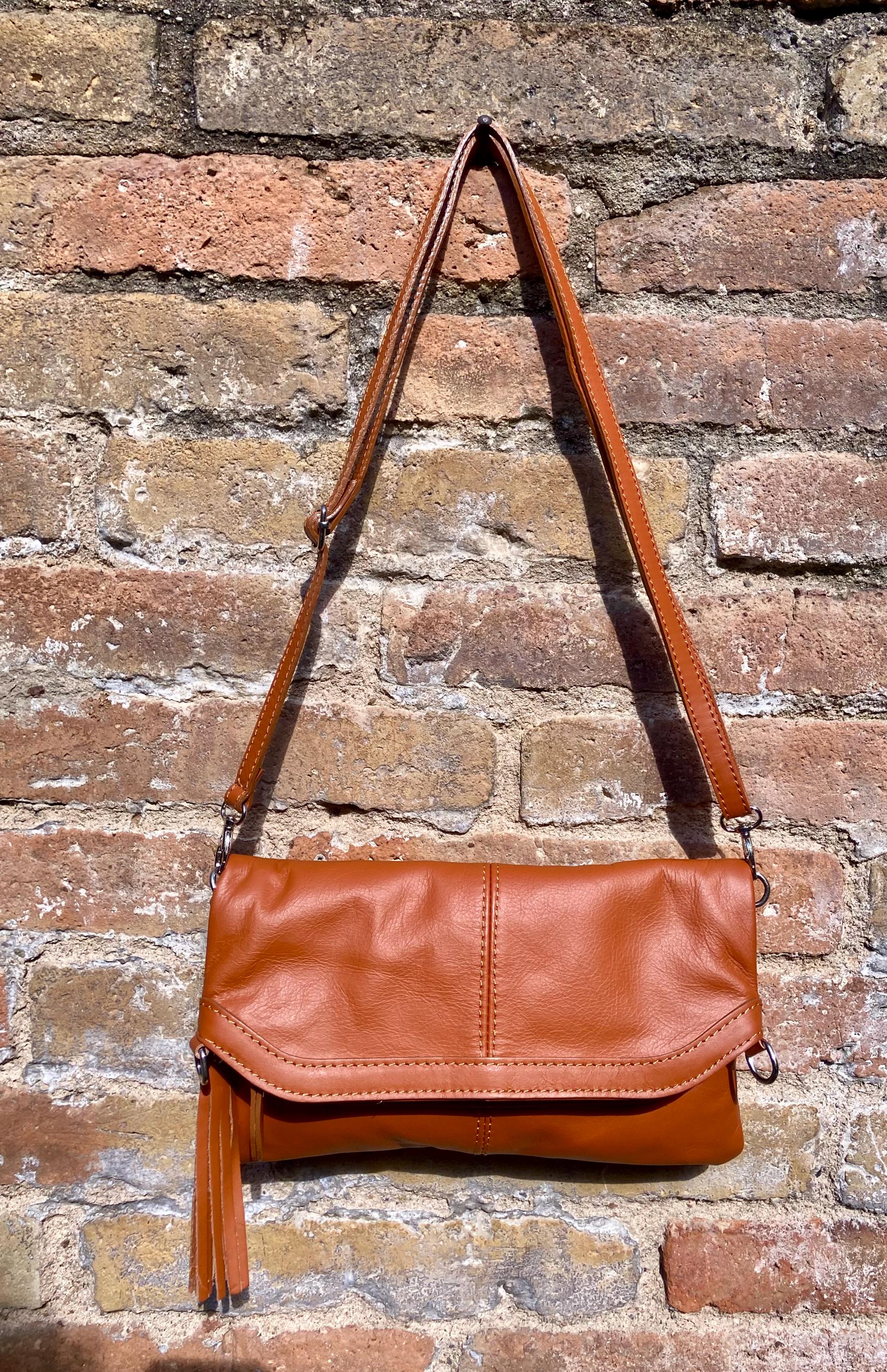 Small leather bag in light camel brown. GENUINE leather crossbody/shoulder bag. Tan brown bag with adjustable strap, zipper and flap.