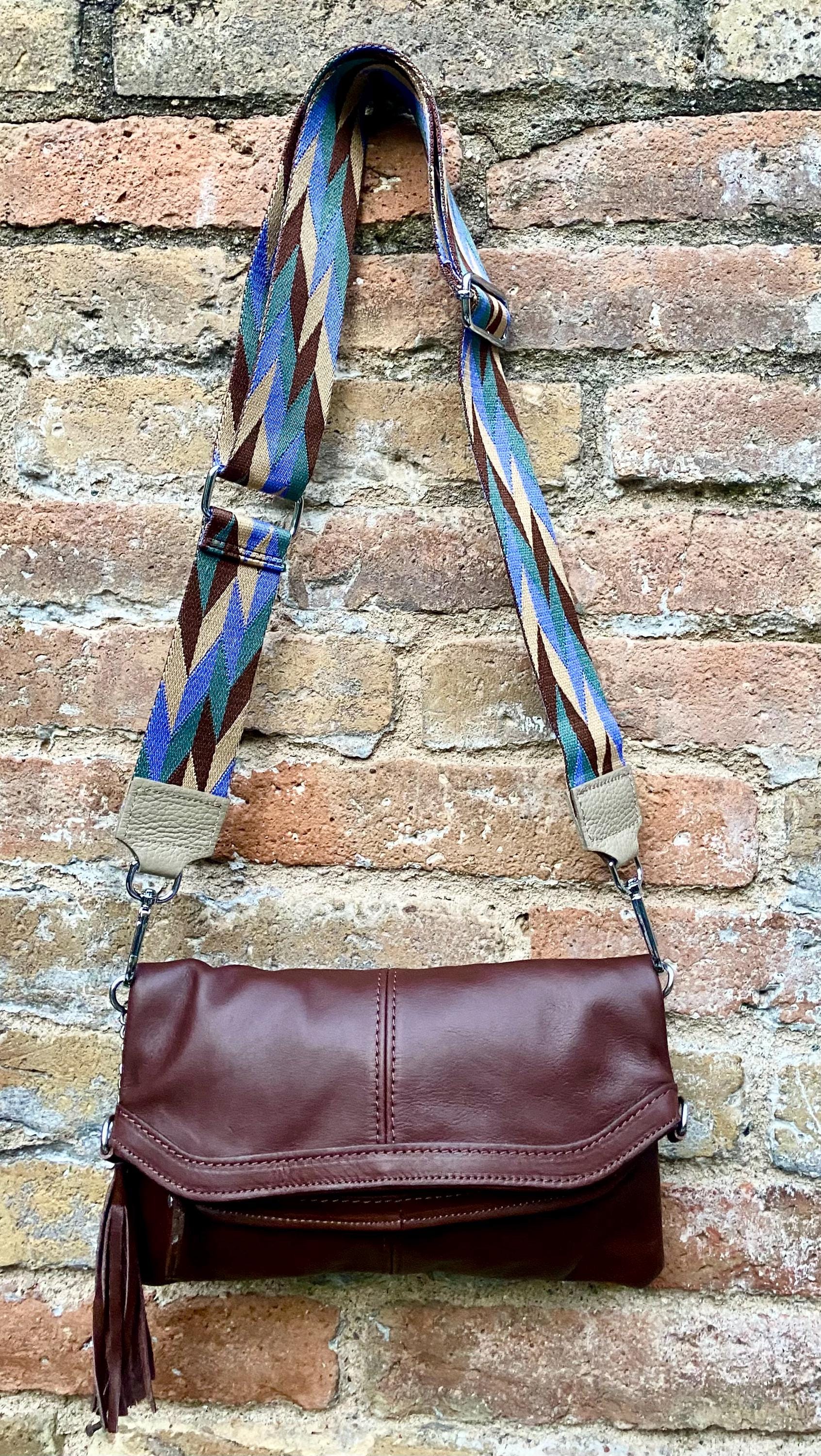 Small leather bag in dark brown. GENUINE leather crossbody/shoulder bag. Adjustable"guitar" strap, zipper and flap. Brown leather purse.