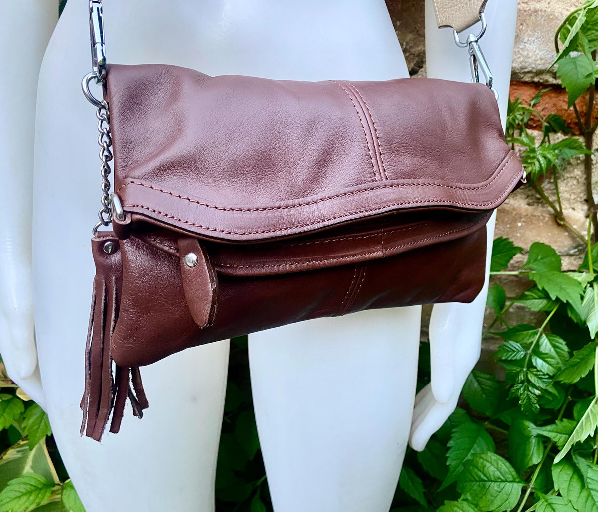 Small leather bag in dark brown. GENUINE leather crossbody/shoulder bag. Adjustable"guitar" strap, zipper and flap. Brown leather purse.