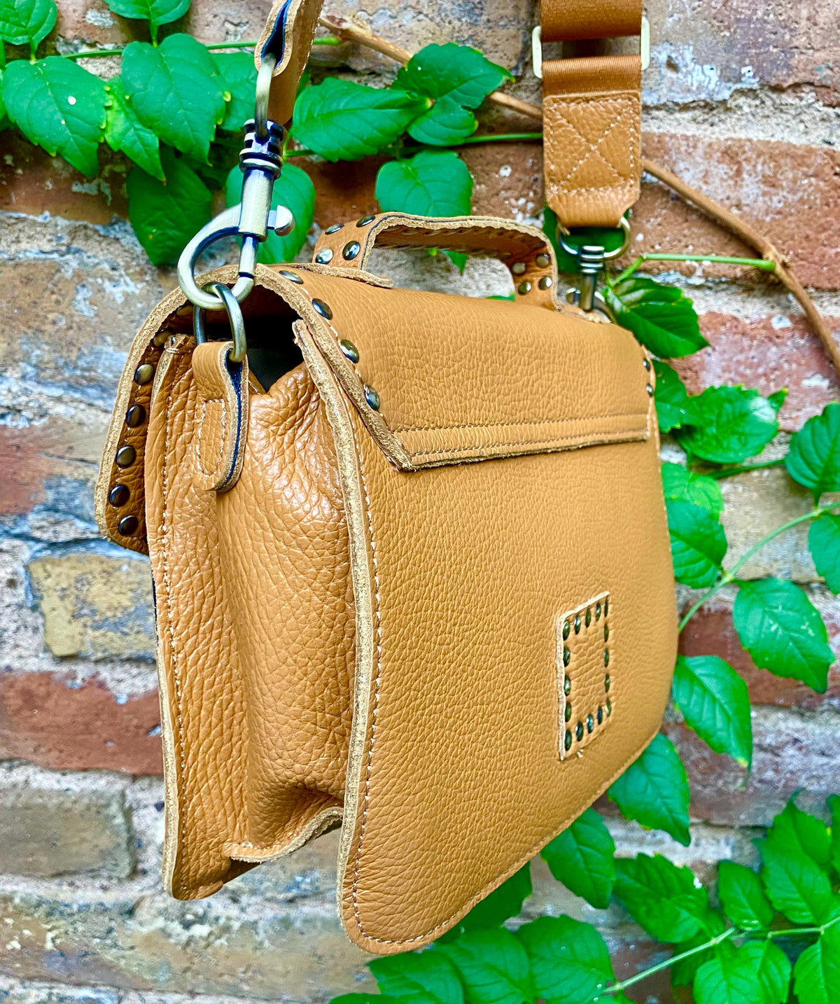 Camel brown leather bag with tacks. Genuine leather small messenger bag. Crossbody / shoulder bag with zipper and flap