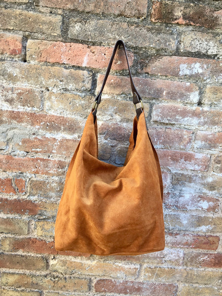 Slouch leather bag in light camel. Light saddle brown hobo bag. Boho bag.Book or tablet bags in suede. Mustard brown soft leather shopper