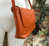 Small leather bag in terracotta - camel brown. Genuine leather cross body / shoulder bag. Adjustable strap, zipper+ flap. Small brown purse