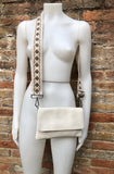 Cream color small leather bag. 2 straps: 1 leather + 1 guitar strap. GENUINE leather Crossbody / shoulder bag. Light beige purse with flap