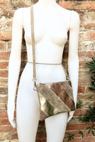 Small party bag in metallic shine leather.Pink, beige and gold cross body or shoulder bag in GENUINE leather. Adjustable strap.Disco 70s