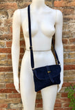 Suede leather bag in NAVY BLUE. Crossbody / shoulder bag in GENUINE leather. Small navy suede purse with adjustable strap and zipper.