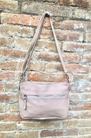 Light pink leather bag. Soft genuine leather messenger bag with tassel. Soft pink crossbody bag. Pink leather purse with zippers